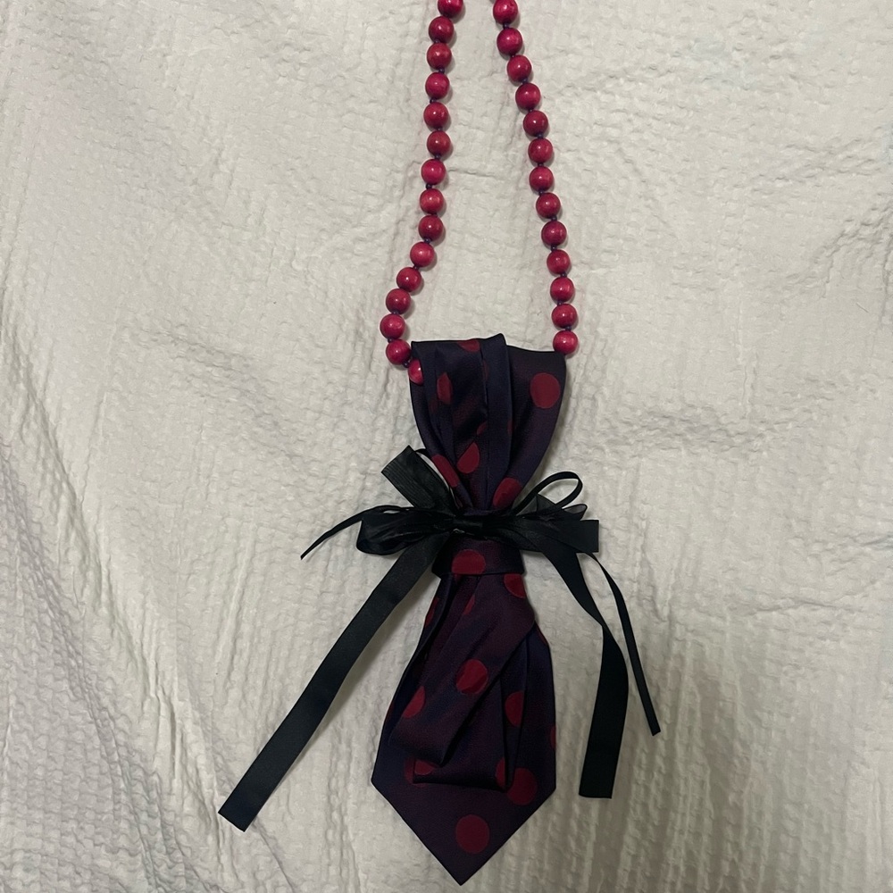 Elegant Pink Beaded Necklace with Bow Accent